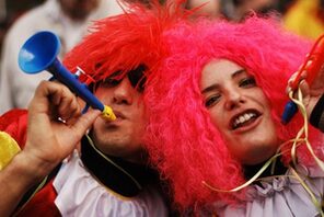 Costumed people celebrating Fastnacht. © Inge Miczka